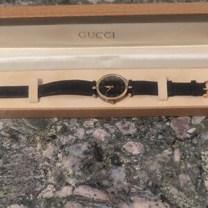 Gucci Black and Gold Leather Timepiece